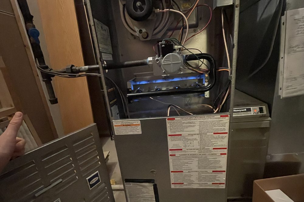 Furnace running with blue burner flames