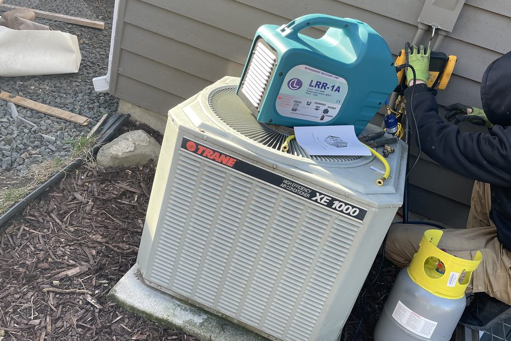 Refrigerant recovery machine on an old condensing unit