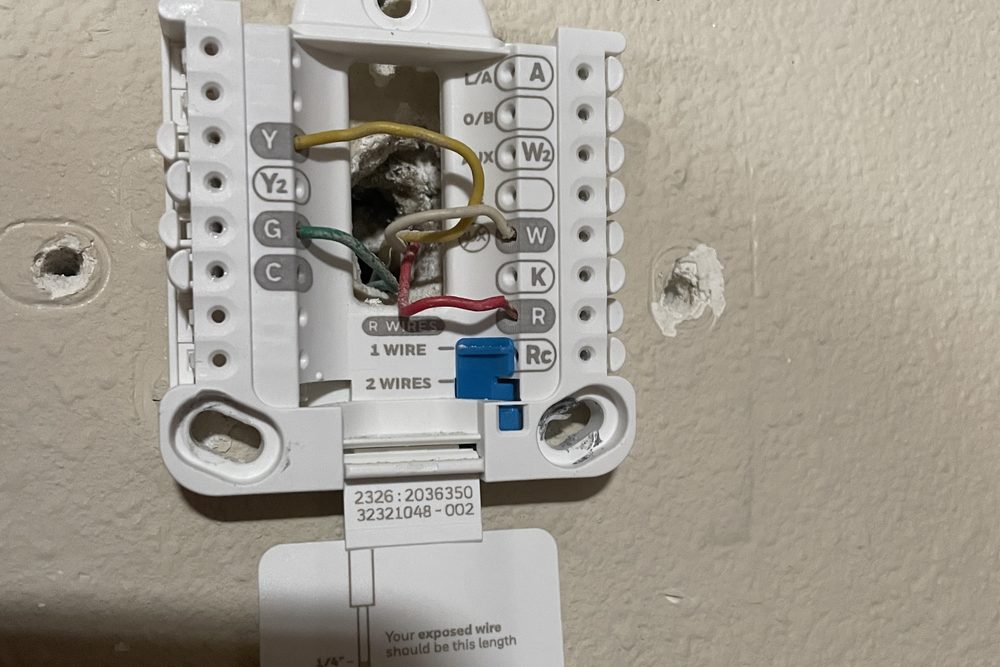 Low-voltage wiring at a wall control